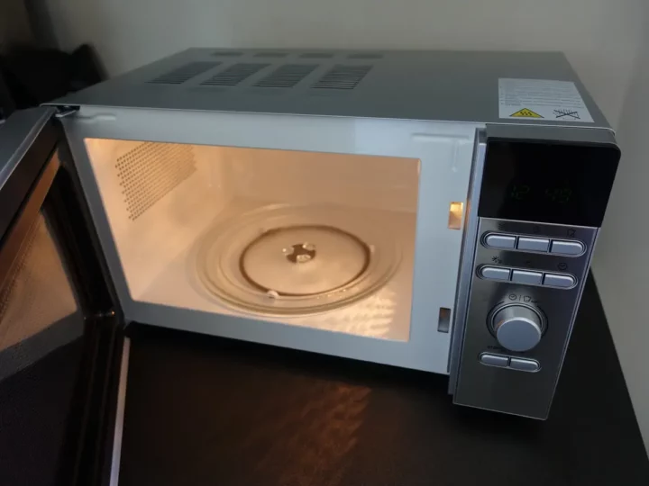 an open microwave oven